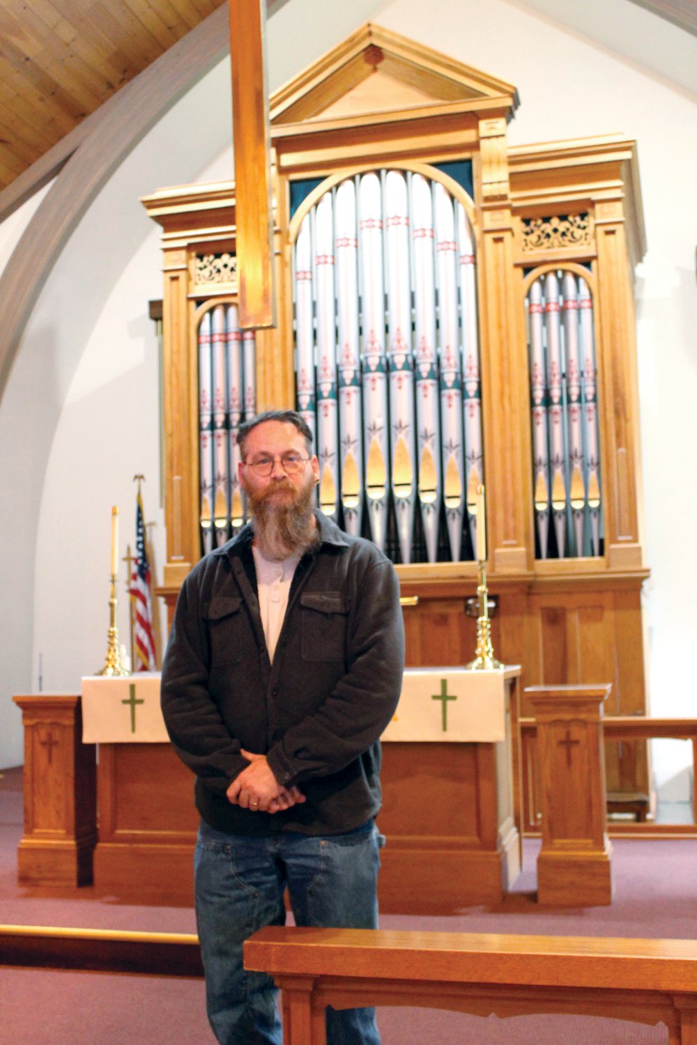 Rev. Jim Odden stands inside St. John’s Lutheran Church in Chehalis.